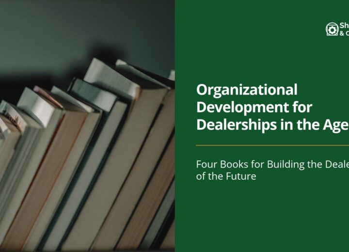 Books lined up on a shelf, representing learning and organizational development.